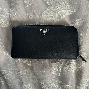 Prada Zipper Wallet.